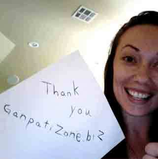 SEO India reviews from international client holding thank you note for Ganpati Zone